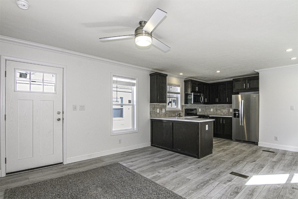 847 Airport Road, Unit 12 Breckenridge, CO 80424 - Photo 32 of 32 a large kitchen with stainless steel appliances granite countertop a stove and a refrigerator