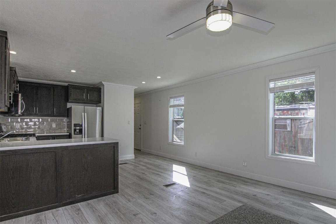 847 Airport Road, Unit 12 Breckenridge, CO 80424 - Photo 8 of 32 a kitchen with stainless steel appliances granite countertop a sink dishwasher a stove and a refrigerator with wooden floor
