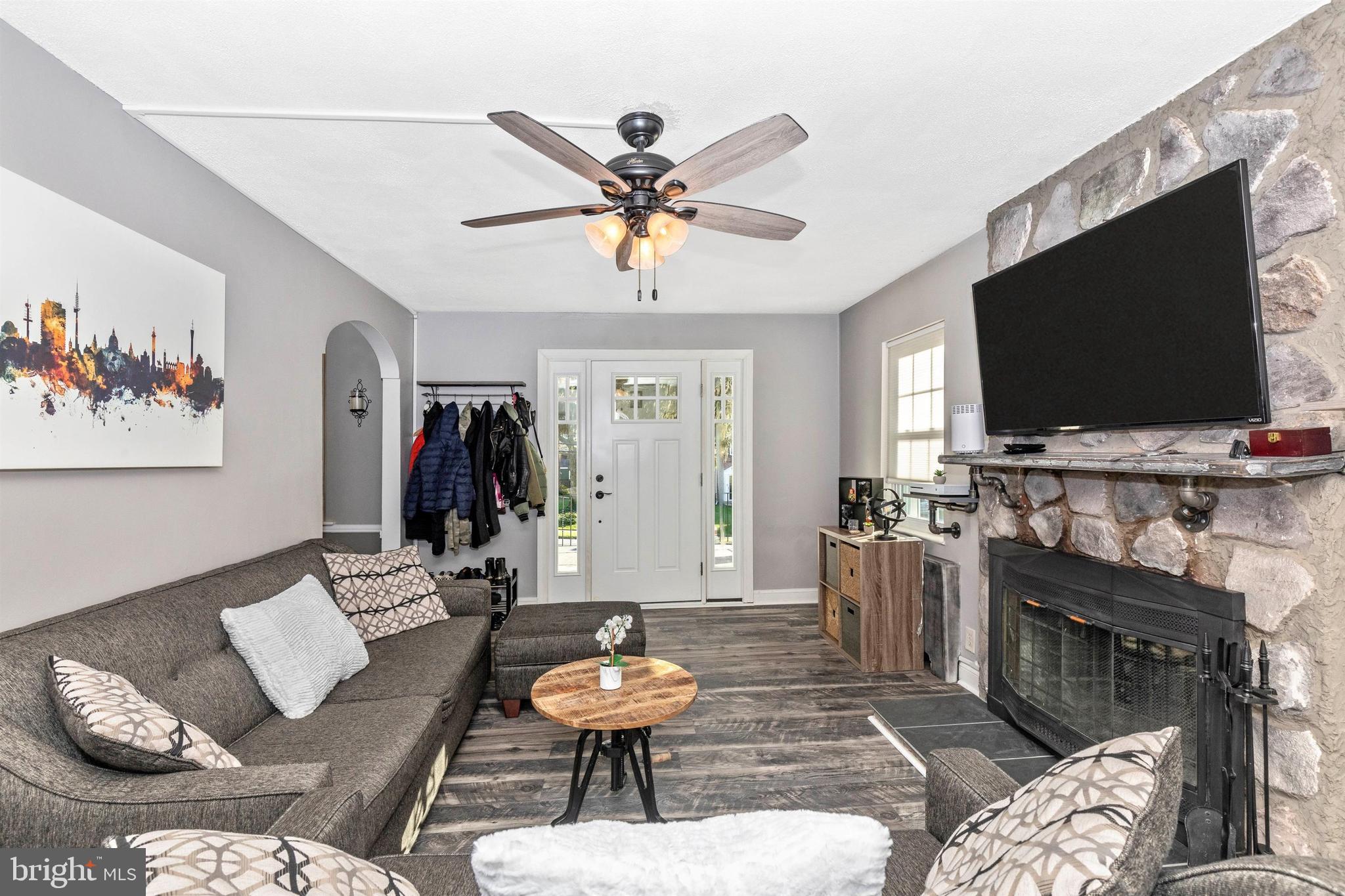 1432 Burmont Road Havertown, PA 19083 - Photo 2 of 28 a living room with furniture and a flat screen tv