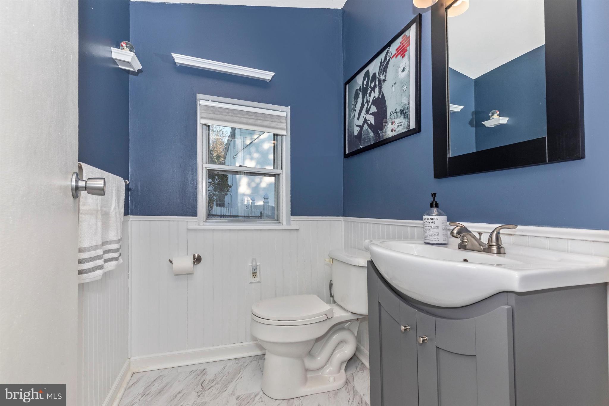 1432 Burmont Road Havertown, PA 19083 - Photo 13 of 28 a bathroom with a sink a toilet and shower