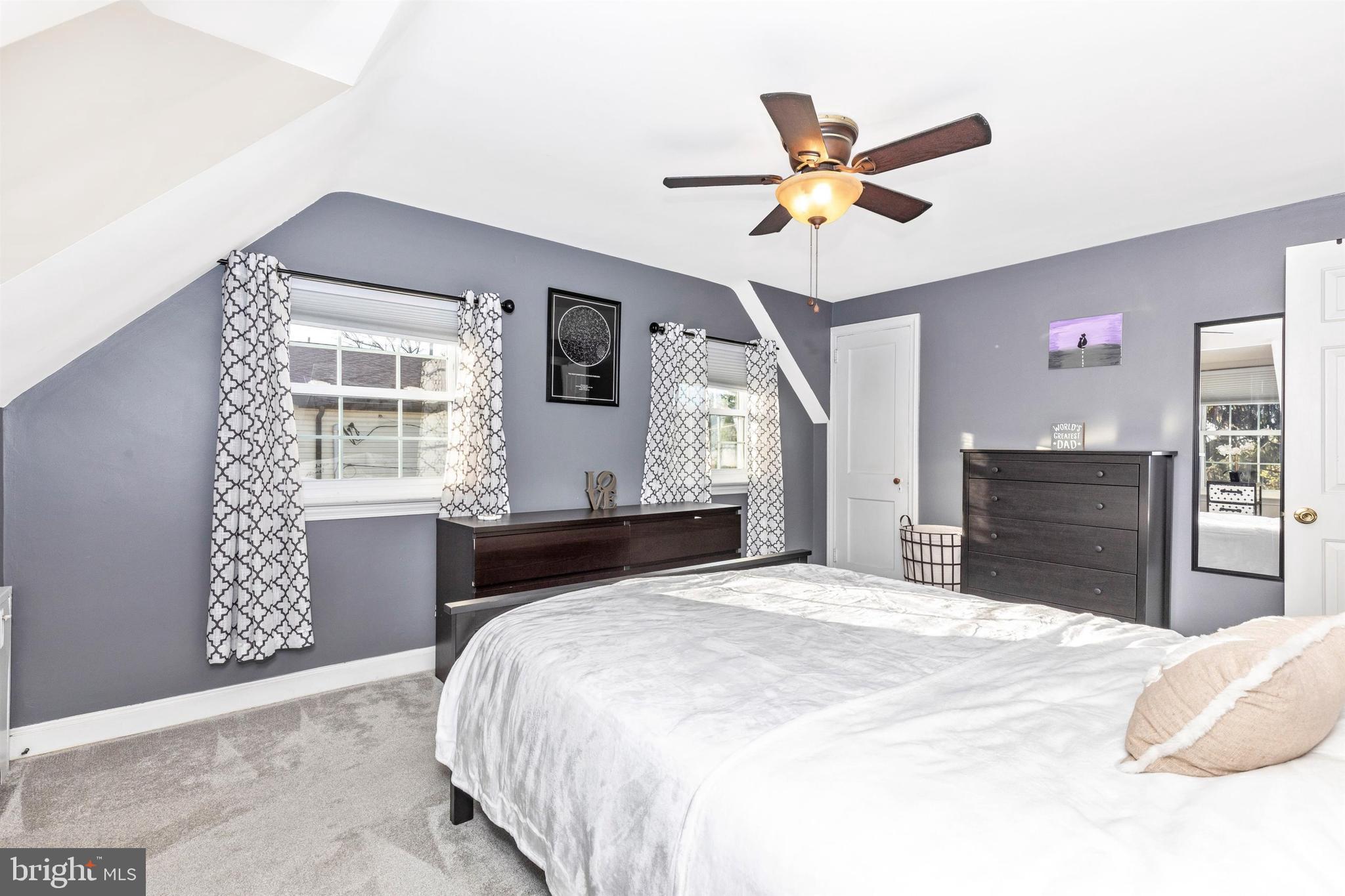 1432 Burmont Road Havertown, PA 19083 - Photo 15 of 28 a bedroom with a bed dresser and a window