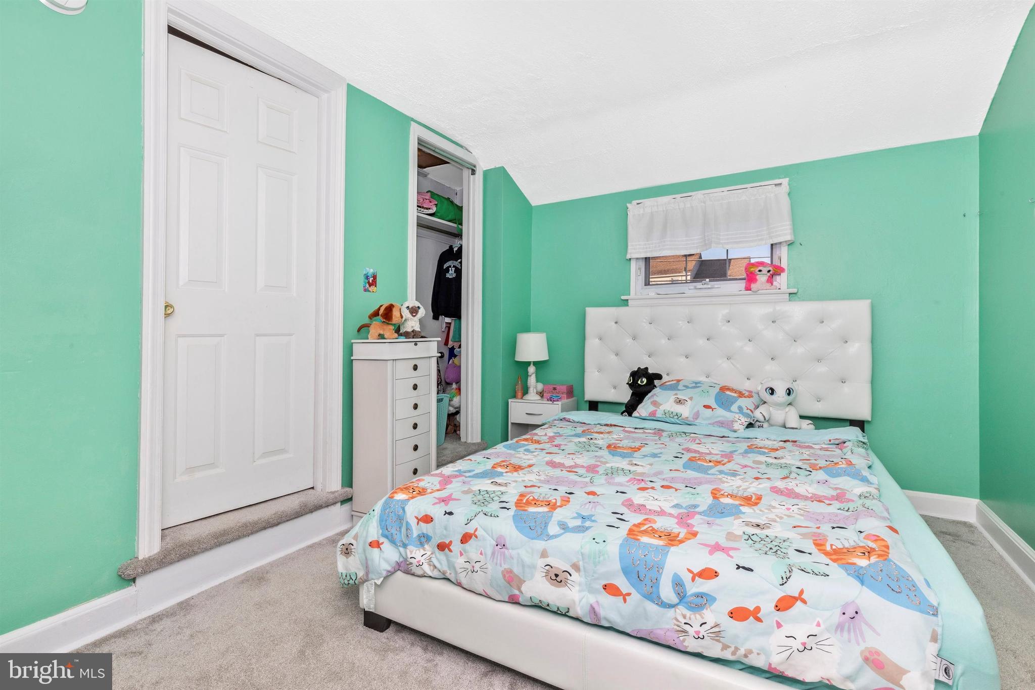 1432 Burmont Road Havertown, PA 19083 - Photo 17 of 28 a bedroom with a bed and a dresser in it