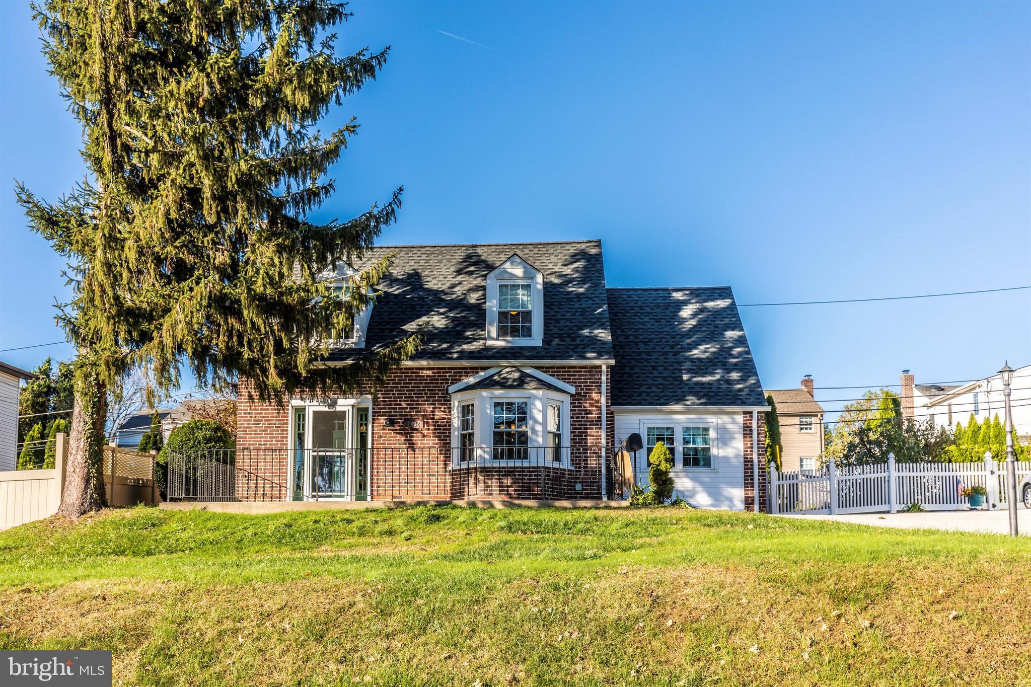 1432 Burmont Road Havertown, PA 19083 - Photo 24 of 28 a view of a building with a yard