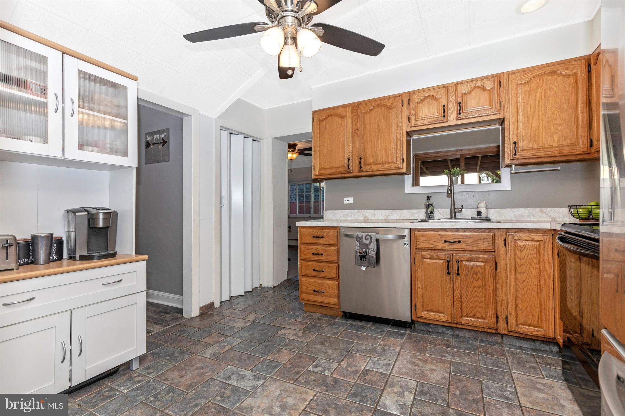 1432 Burmont Road Havertown, PA 19083 - Photo 10 of 28 a kitchen with cabinets appliances and a sink