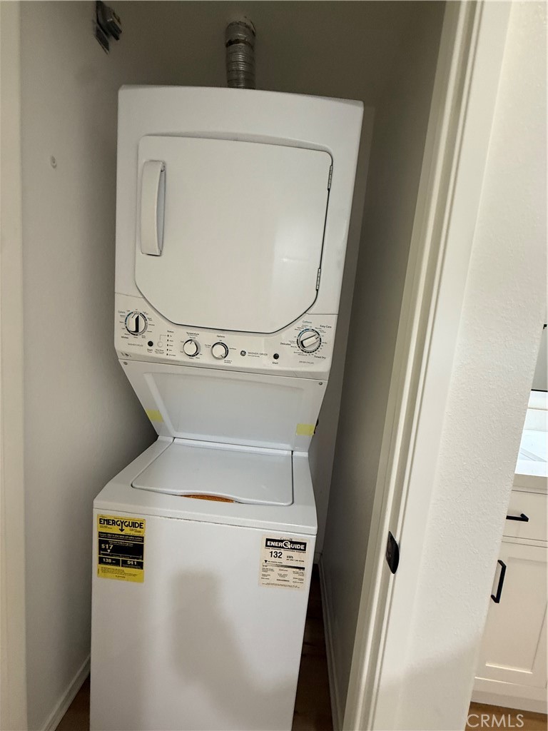 2457 Watermarke Place Irvine, CA 92612 - Photo 10 of 13 a utility room with dryer and washer