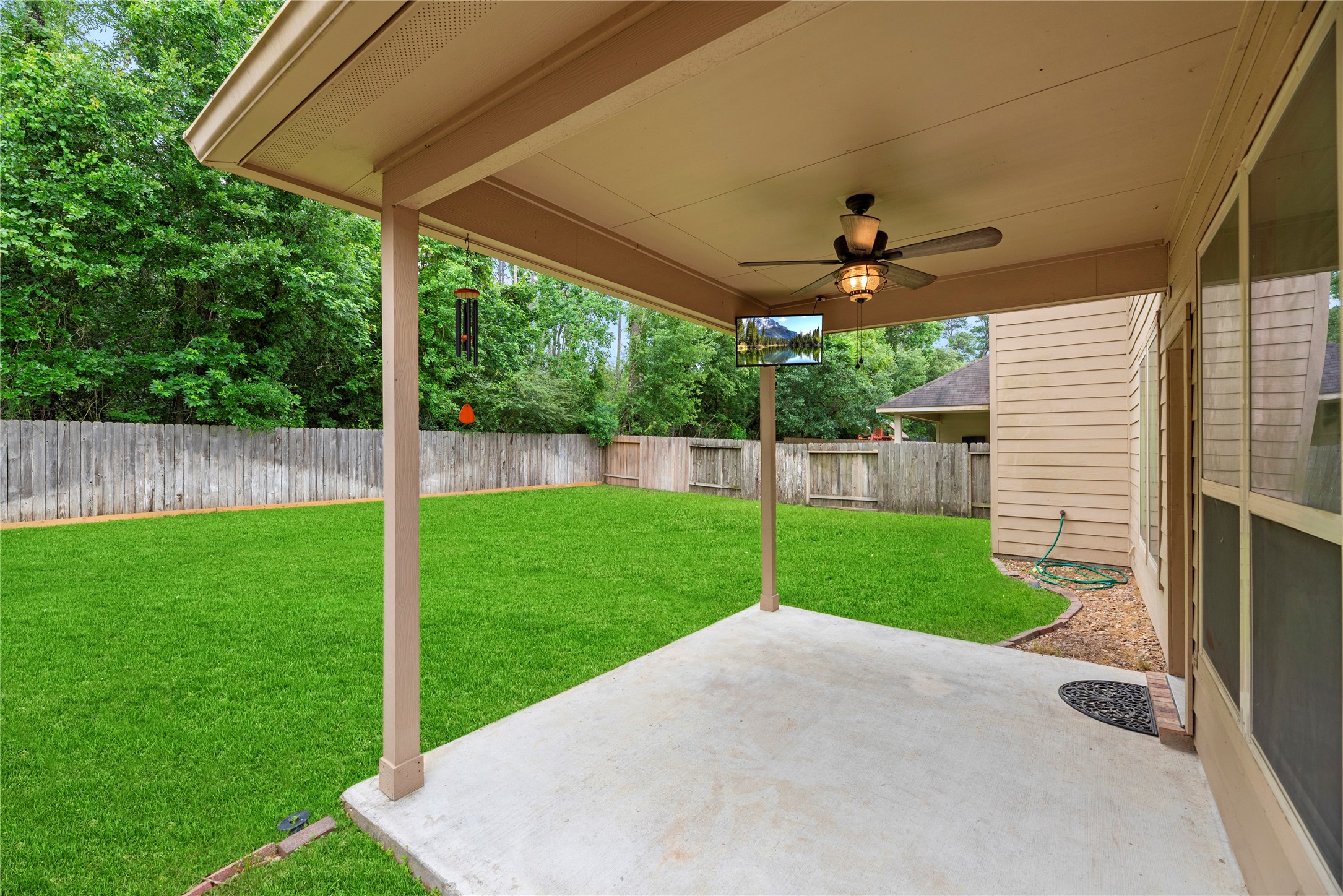 22514 Forbes Field Trail Spring, TX 77389 - Photo 2 of 37 a view of a backyard with plants and a garden