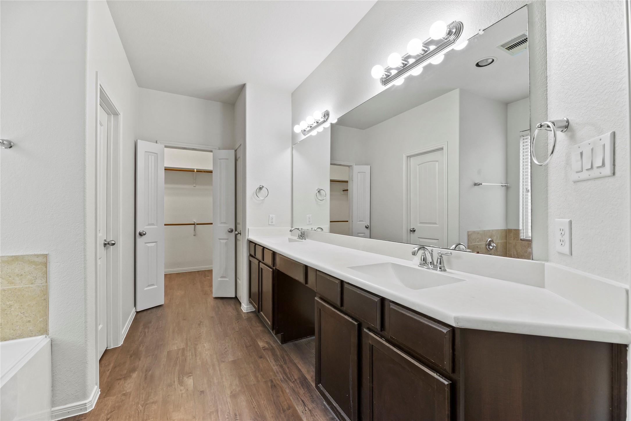 22514 Forbes Field Trail Spring, TX 77389 - Photo 21 of 37 a bathroom with a double vanity sink mirror and shower
