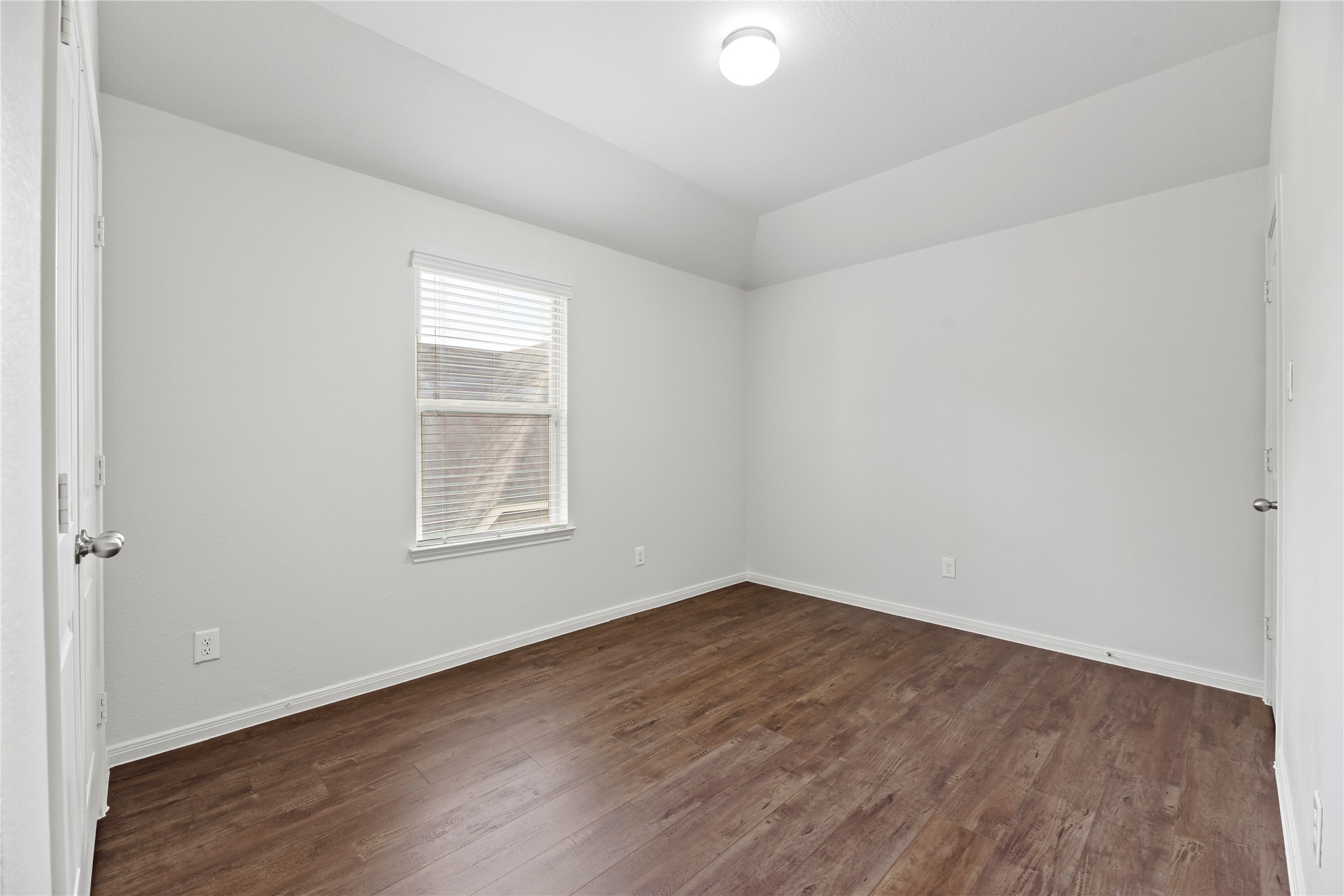 22514 Forbes Field Trail Spring, TX 77389 - Photo 27 of 37 an empty room with wooden floor and windows