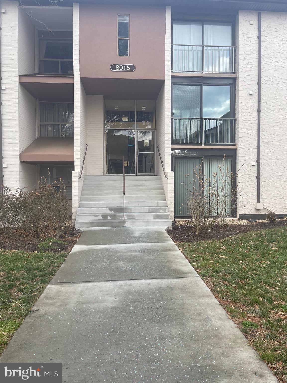 a front view of a house with a porch