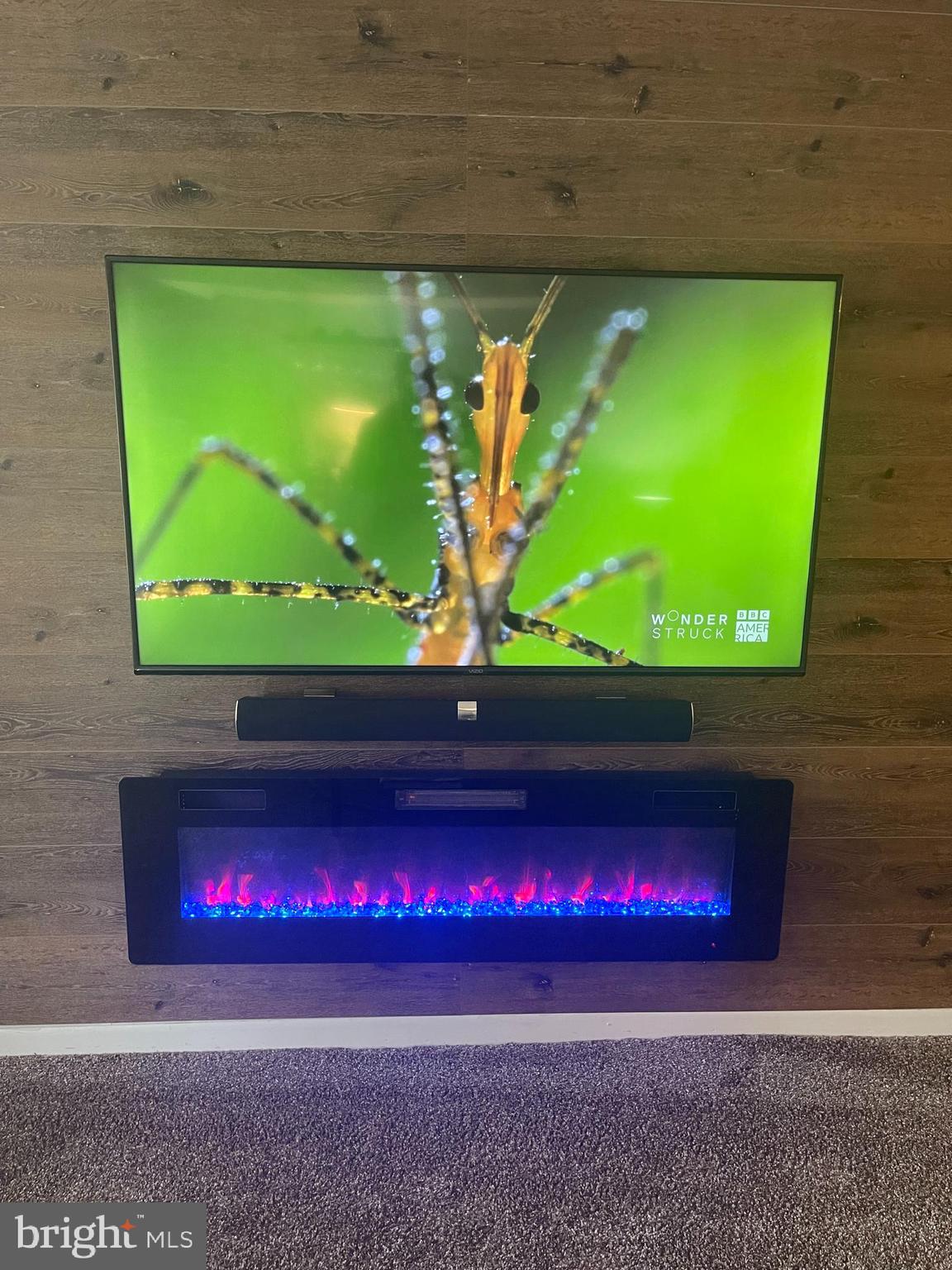 8015 Mandan Road, Unit 202 Greenbelt, MD 20770 - Photo 12 of 52 a room with a soccer table and a painting