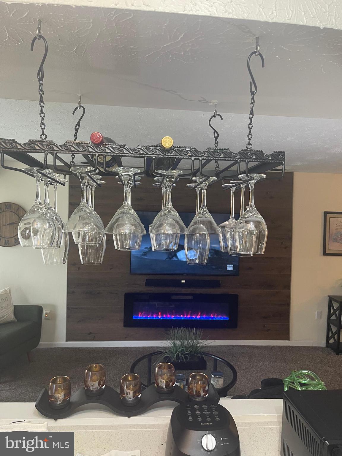 8015 Mandan Road, Unit 202 Greenbelt, MD 20770 - Photo 17 of 52 a table with wine bottles and on top