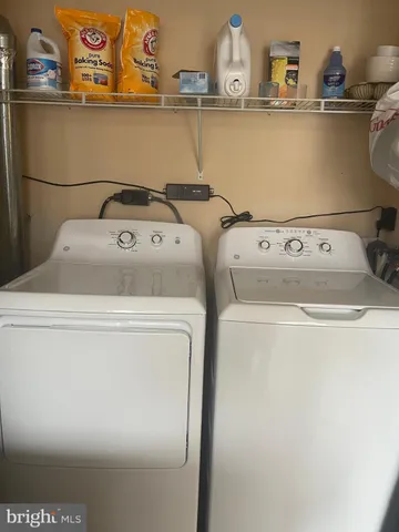 a living room with furniture and a gate