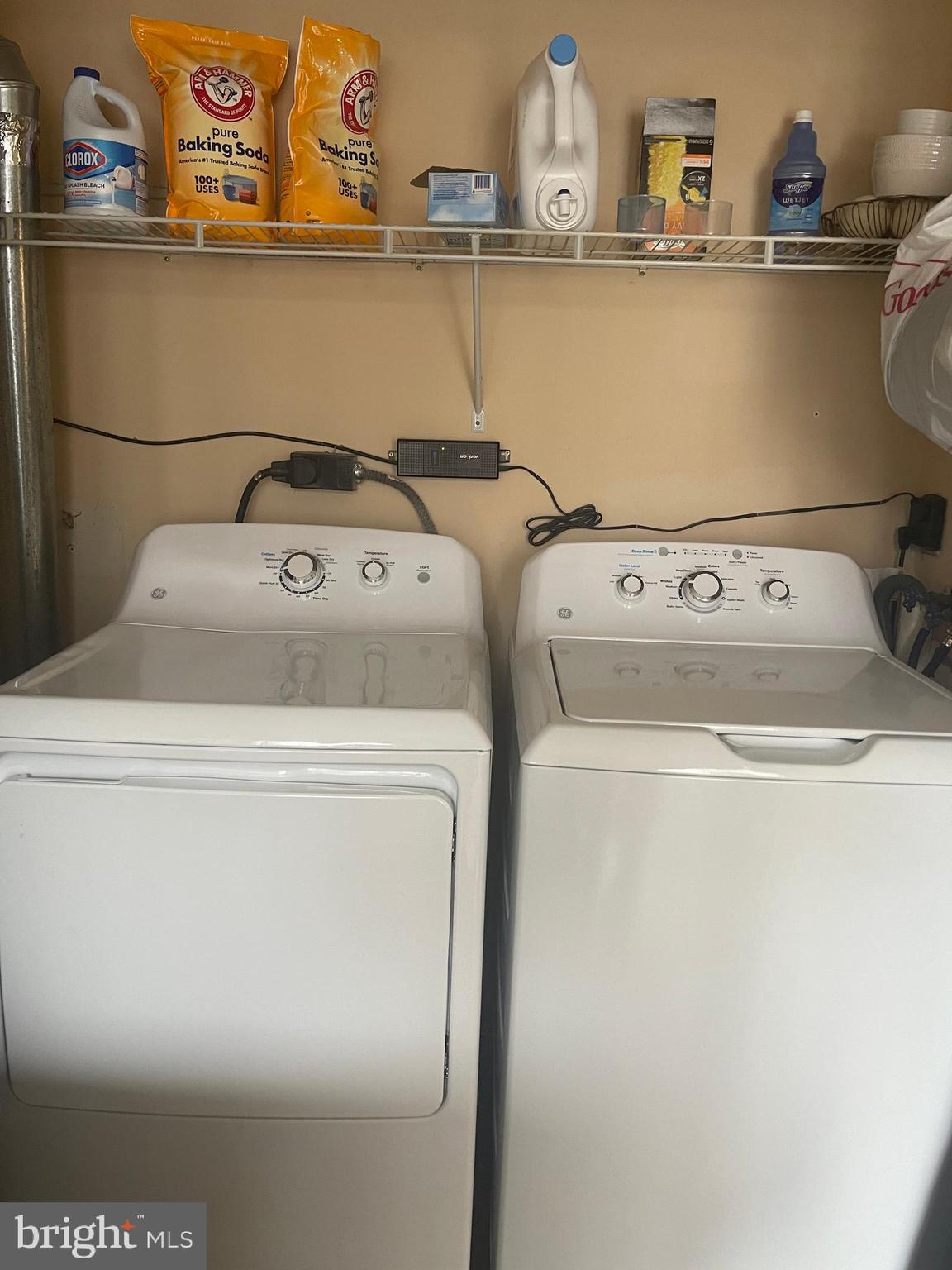8015 Mandan Road, Unit 202 Greenbelt, MD 20770 - Photo 22 of 52 a utility room with dryer and washer