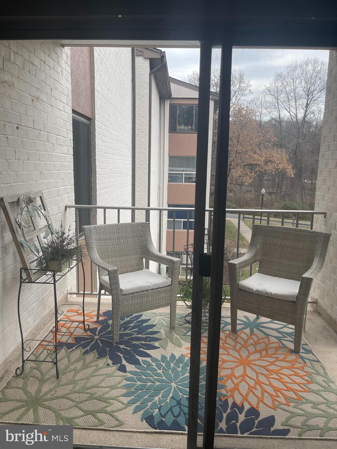 8015 Mandan Road, Unit 202 Greenbelt, MD 20770 - Photo 25 of 52 a dining room with furniture and wooden floor