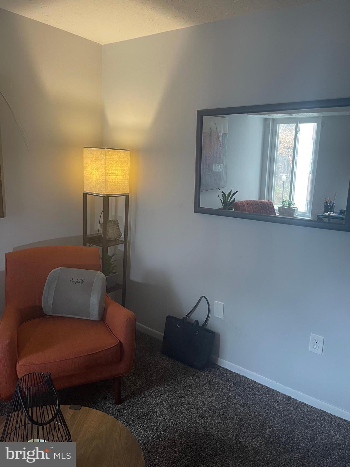 8015 Mandan Road, Unit 202 Greenbelt, MD 20770 - Photo 42 of 52 a outdoor living space with furniture and a potted plant