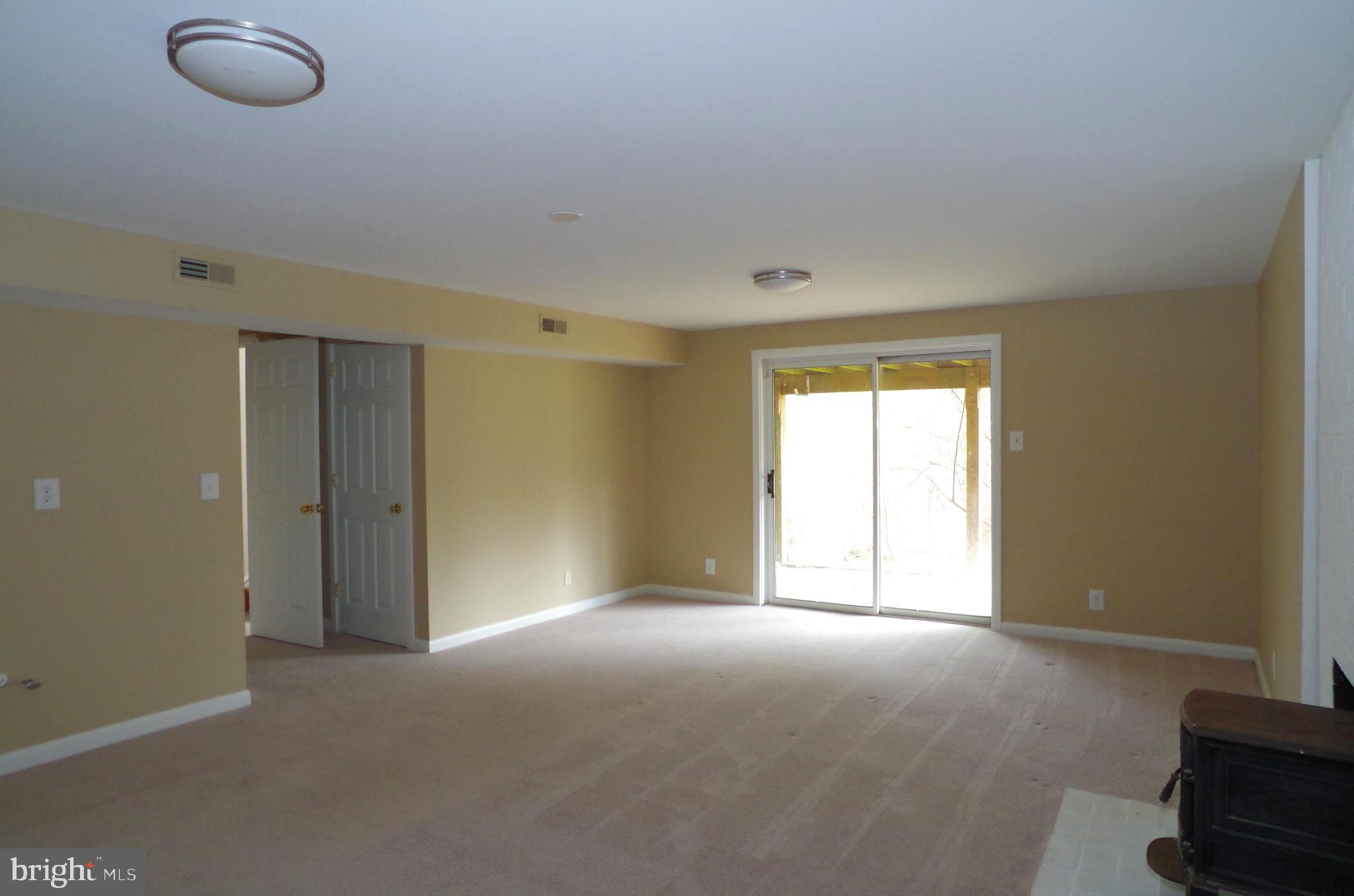 10929 Beach Mill Road Great Falls, VA 22066 - Photo 16 of 18 Recreation Room w/ Fireplace