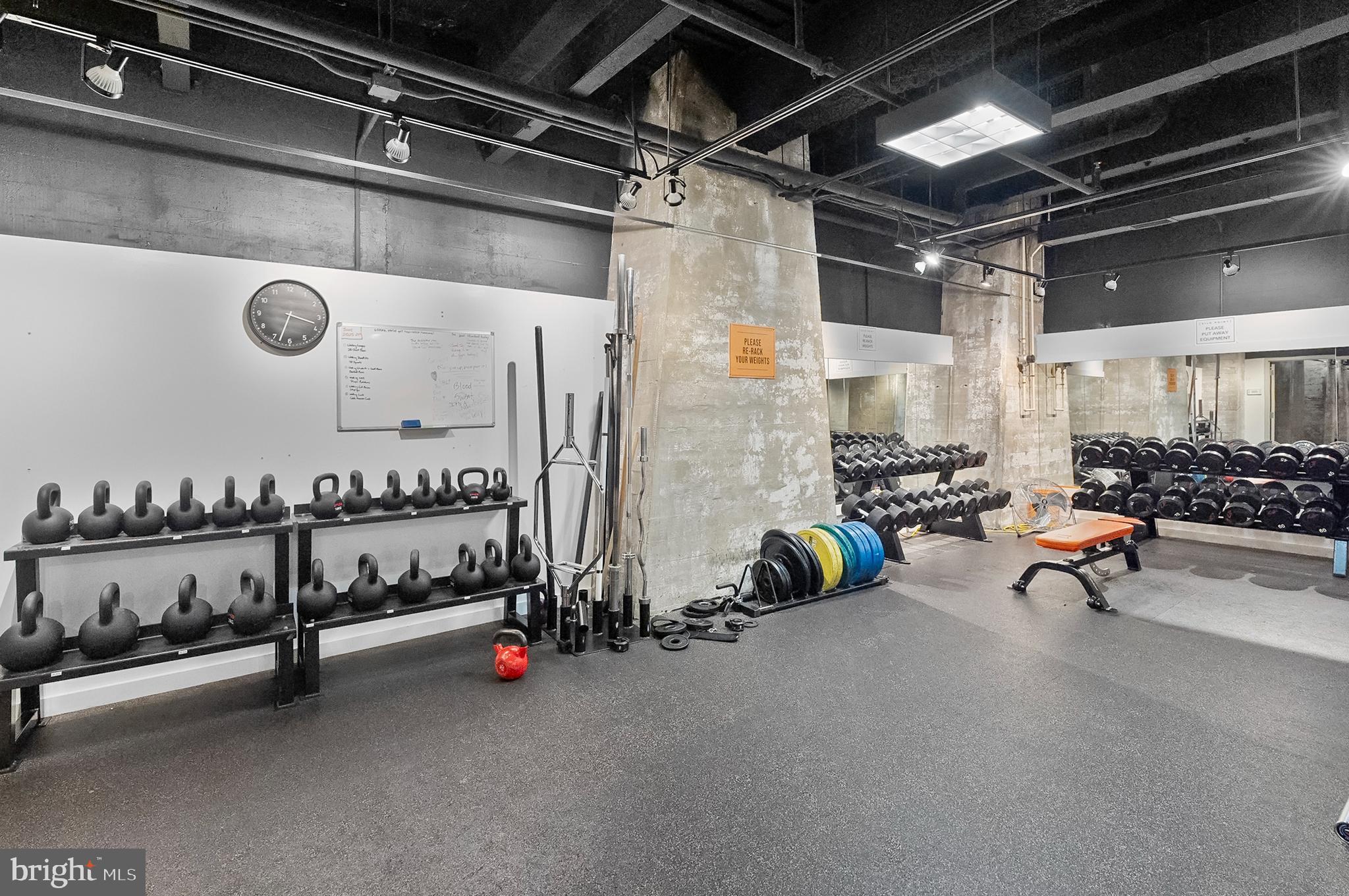 1200 Steuart Street, Unit 530 Baltimore, MD 21230 - Photo 27 of 38 a view of a room with gym equipment