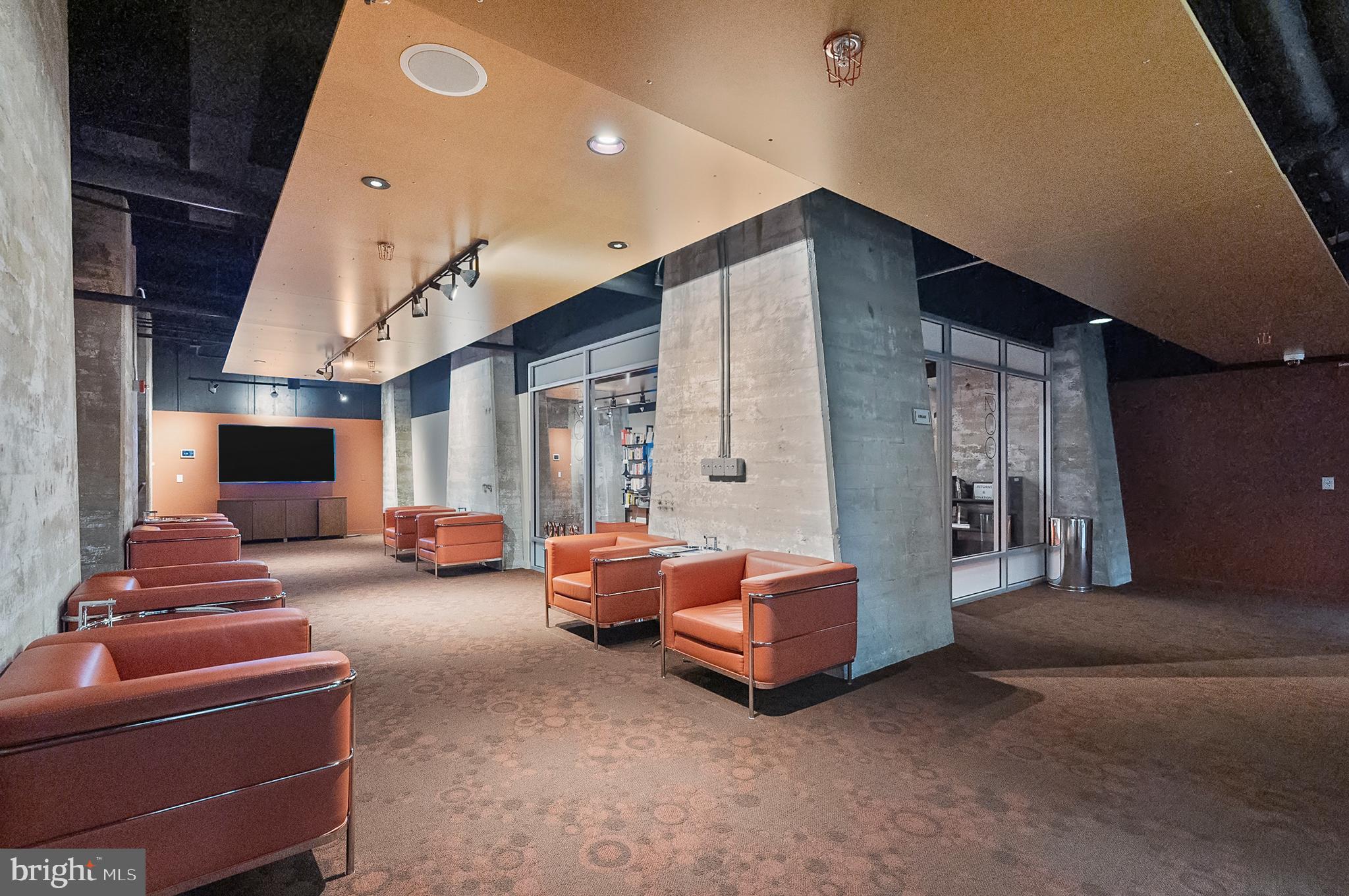 1200 Steuart Street, Unit 530 Baltimore, MD 21230 - Photo 29 of 38 a living room with furniture and a window