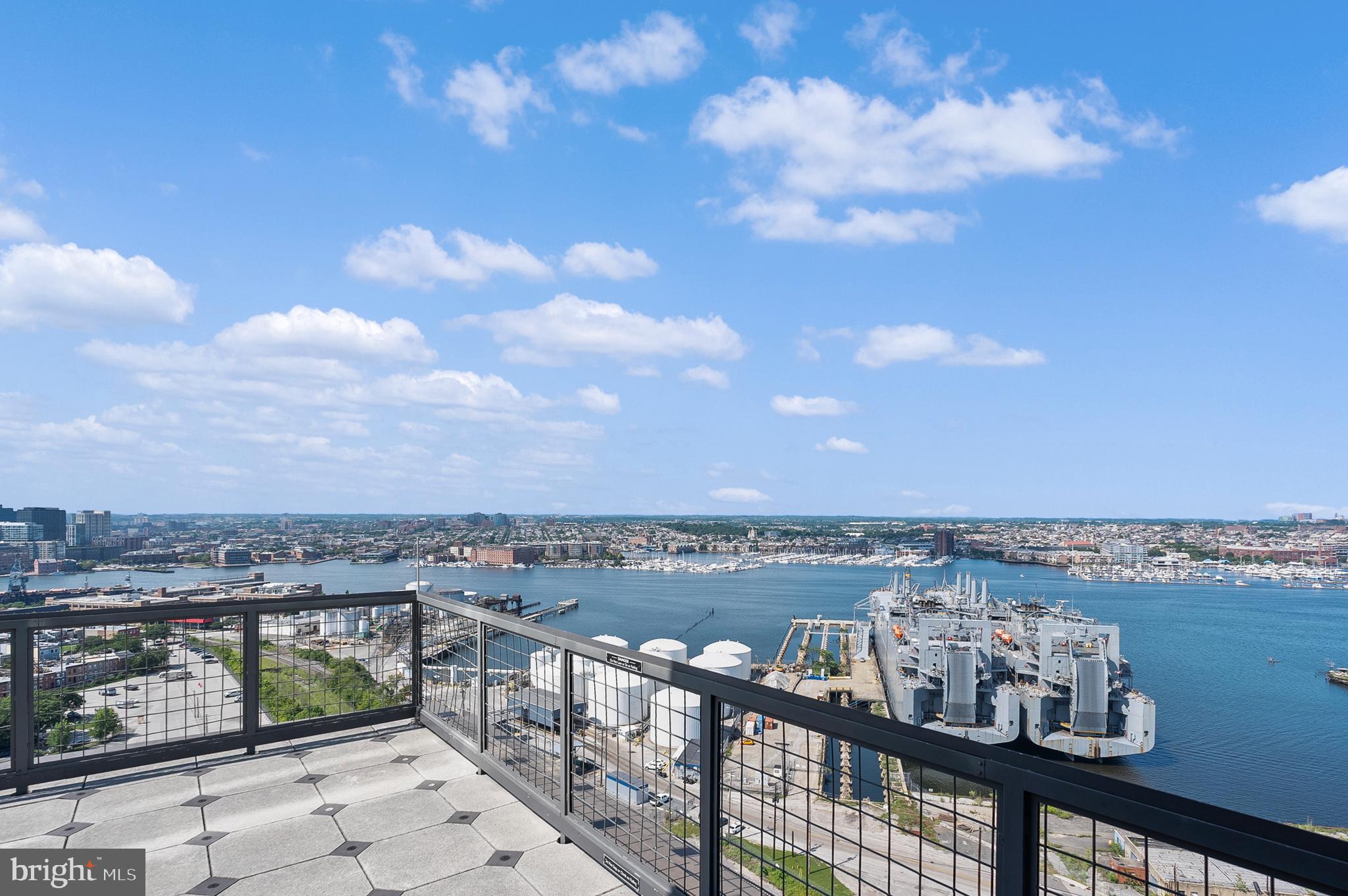 1200 Steuart Street, Unit 530 Baltimore, MD 21230 - Photo 36 of 38 a view of a lake from a balcony