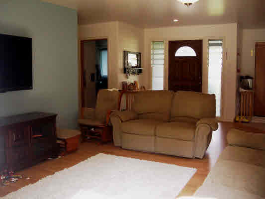 6685 Puupilo Road Kapaa, HI 96746 - Photo 3 of 25 a living room with furniture and a flat screen tv