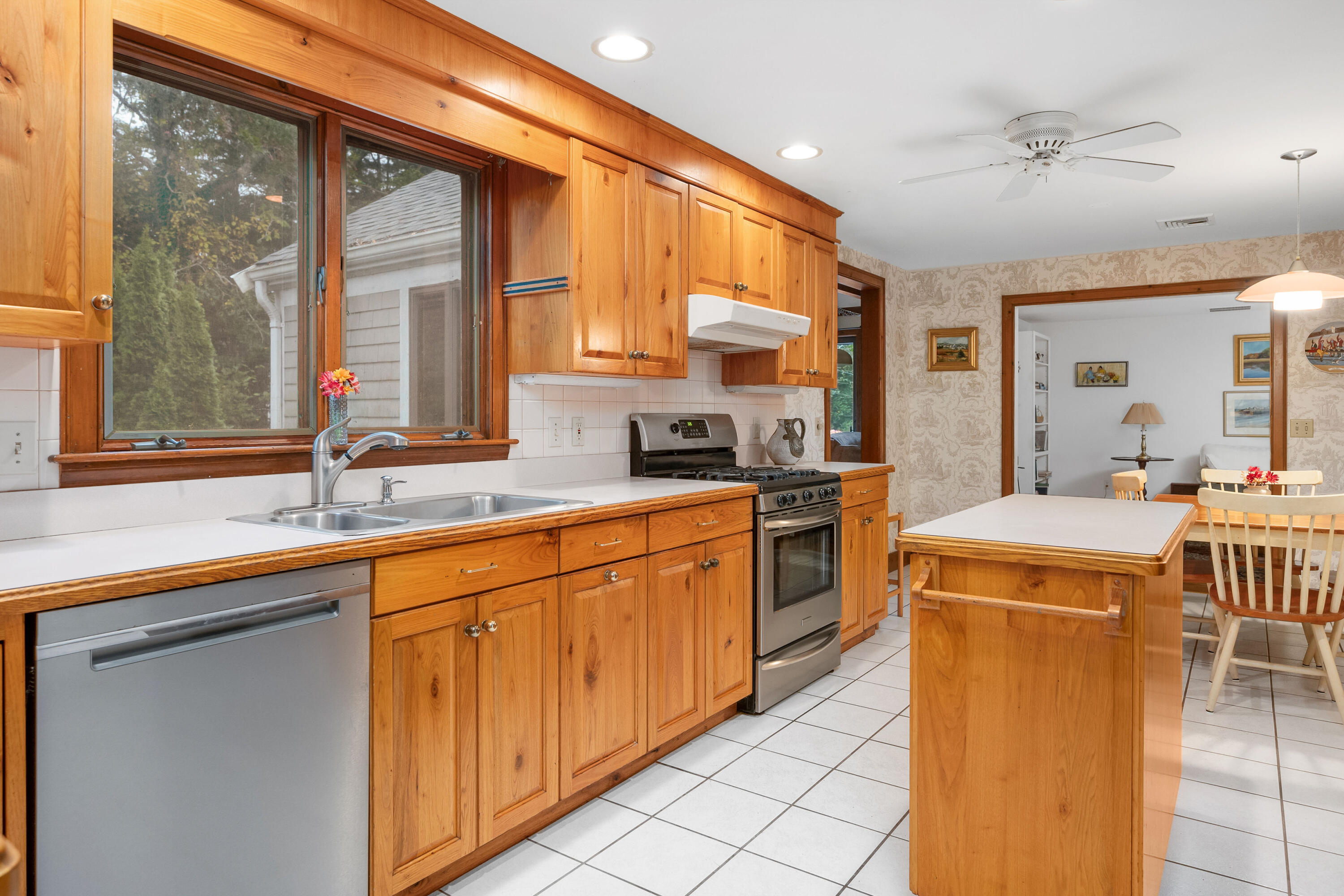 33 Oxner Road Centerville, MA 02632 - Photo 11 of 26 a kitchen that has a sink and a stove in it