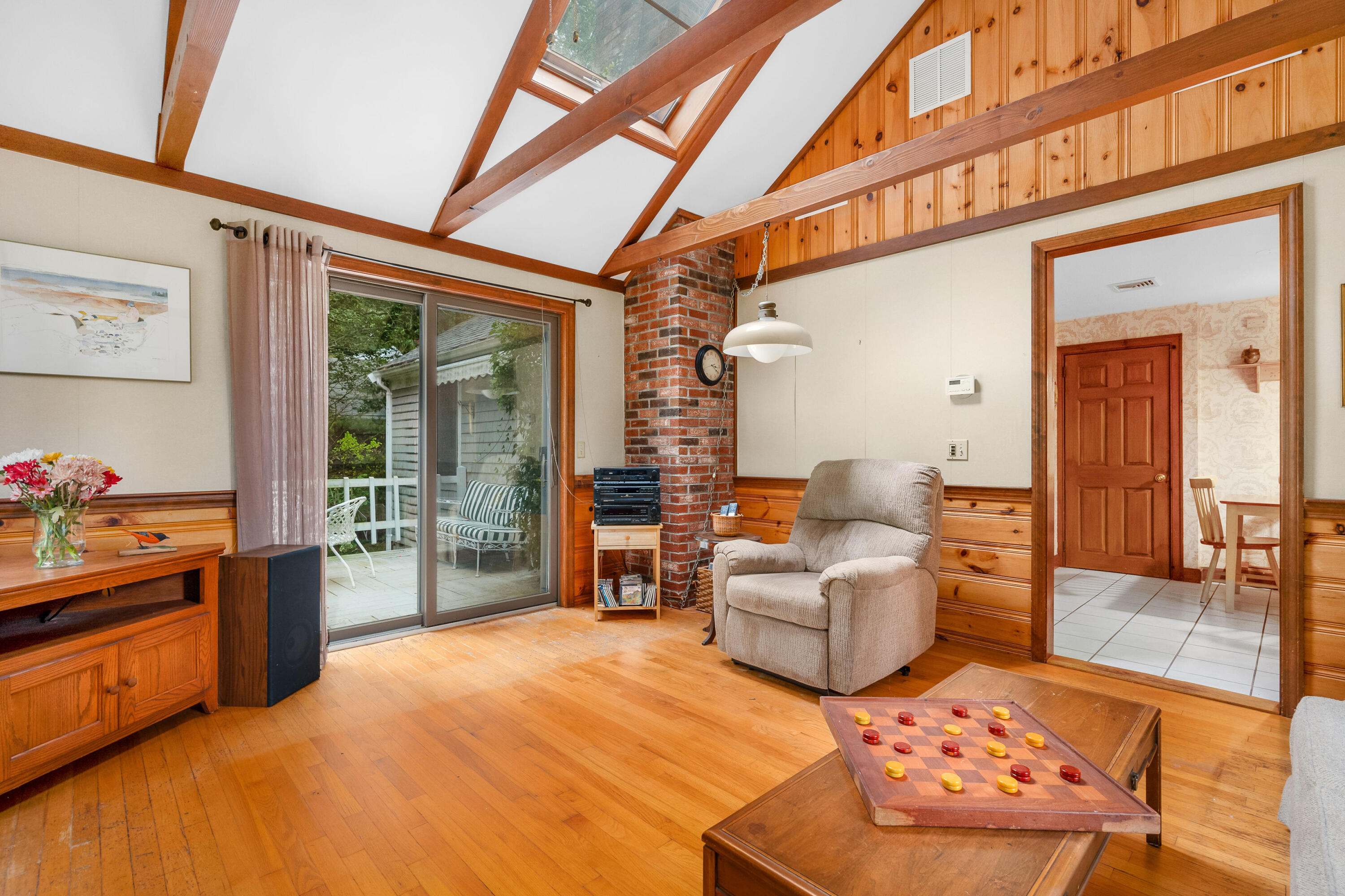 33 Oxner Road Centerville, MA 02632 - Photo 14 of 26 a living room with furniture and a floor to ceiling window