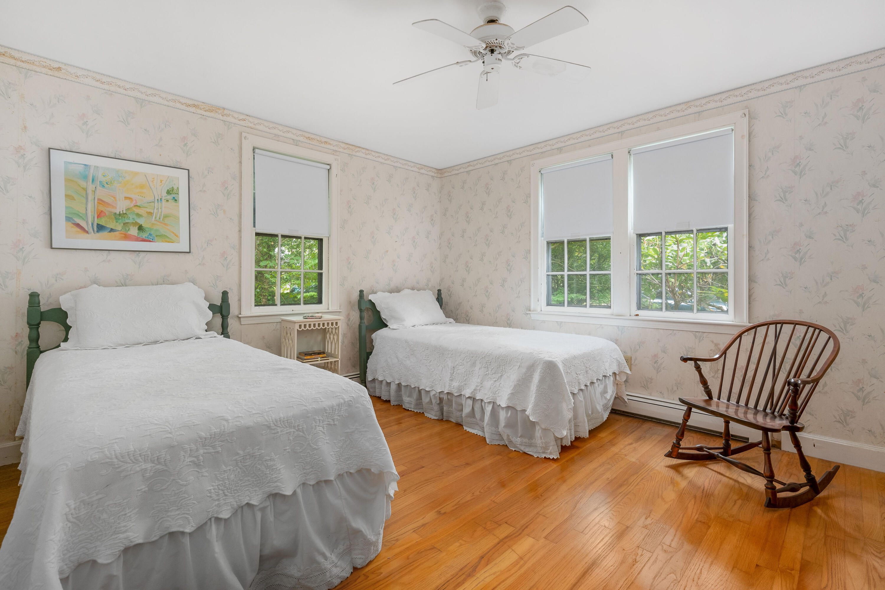 33 Oxner Road Centerville, MA 02632 - Photo 16 of 26 a spacious bedroom with two beds and a chair
