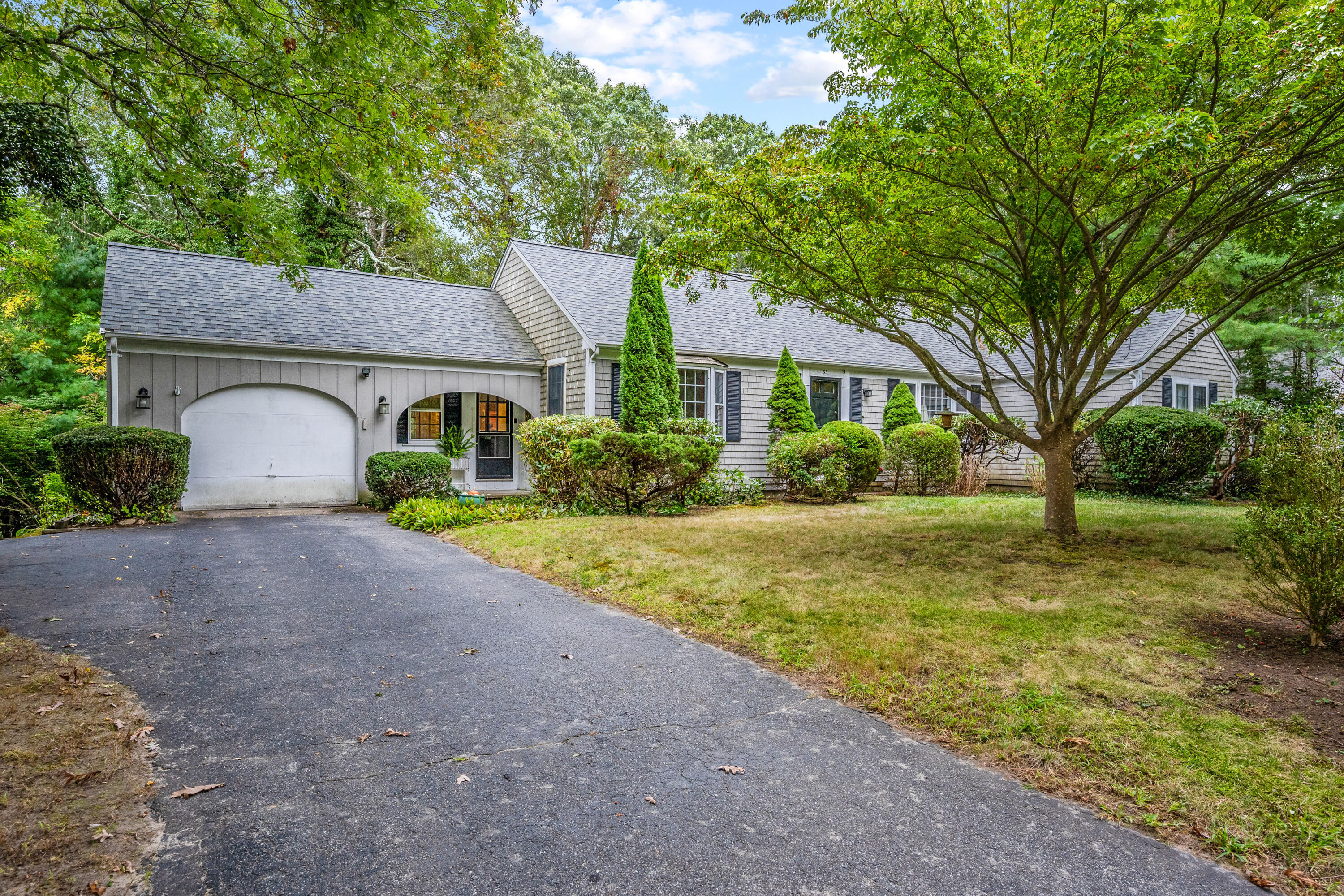 33 Oxner Road Centerville, MA 02632 - Photo 2 of 26 a house view with a outdoor space