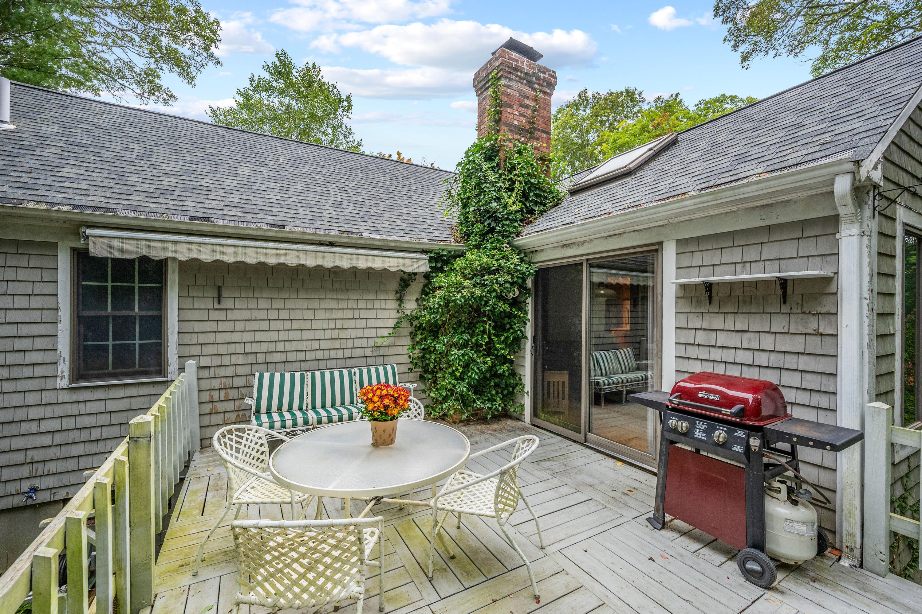 33 Oxner Road Centerville, MA 02632 - Photo 22 of 26 a front view of a house with outdoor seating