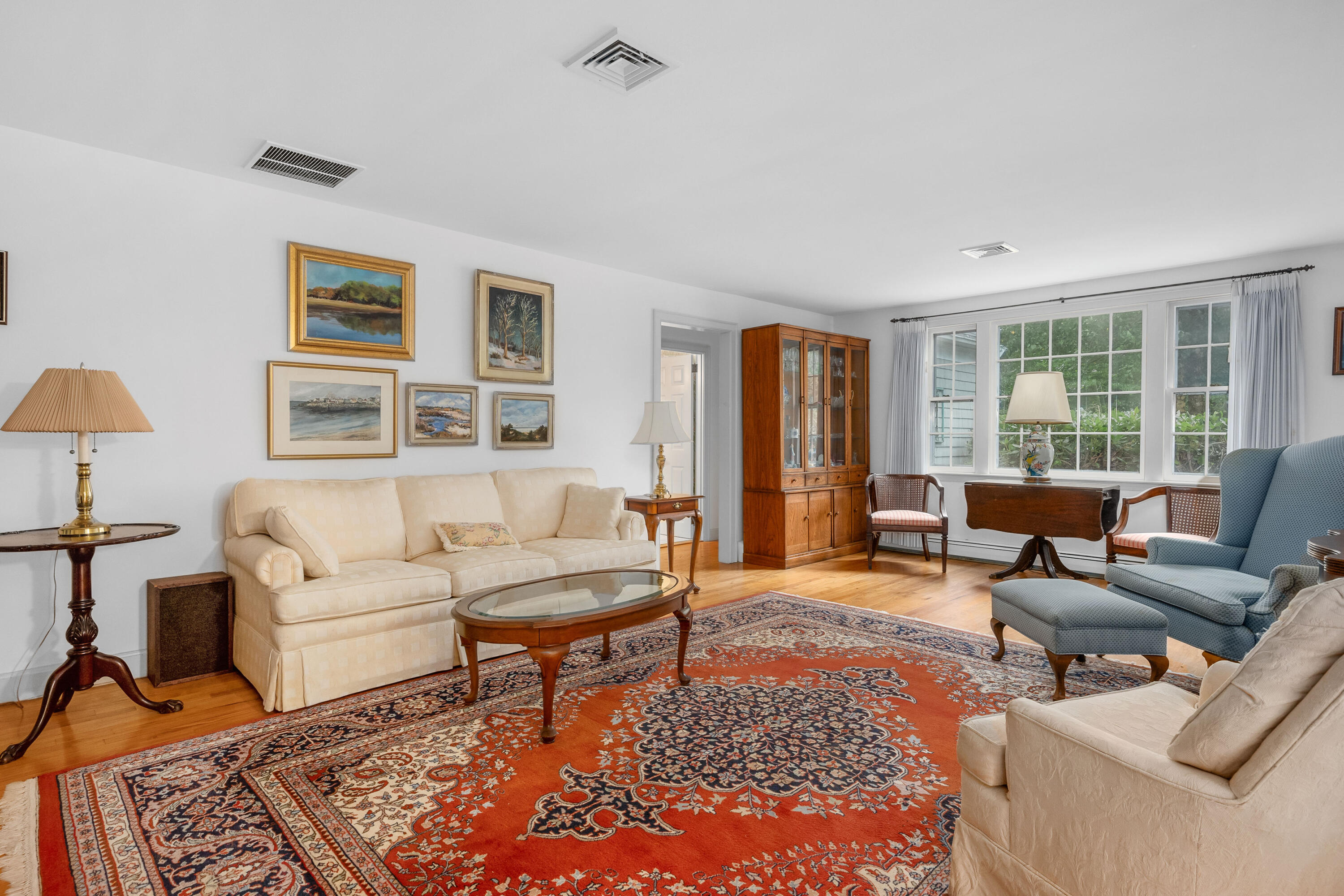 33 Oxner Road Centerville, MA 02632 - Photo 6 of 26 a living room with furniture and a large window