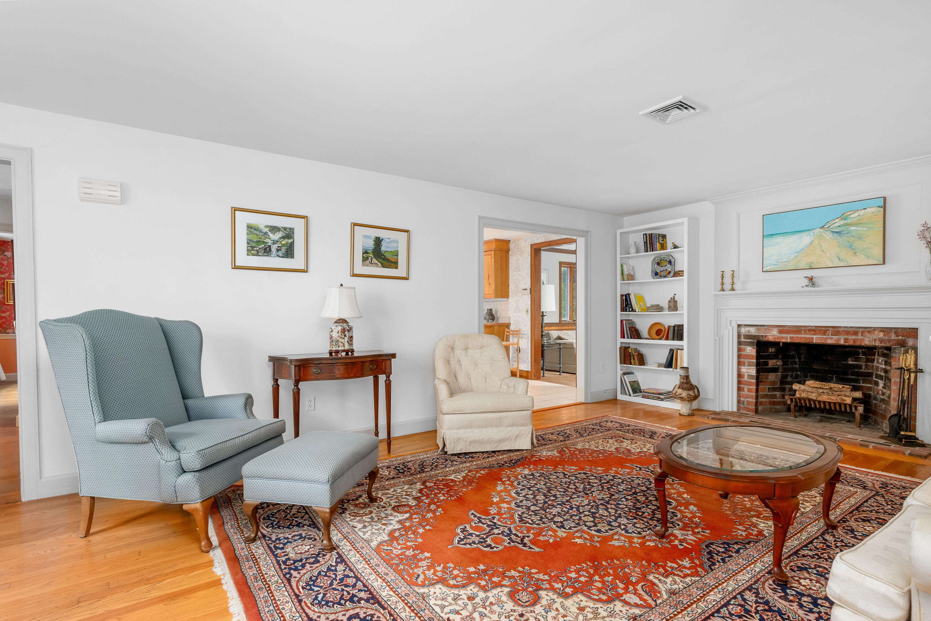 33 Oxner Road Centerville, MA 02632 - Photo 7 of 26 a living room with furniture and a fireplace
