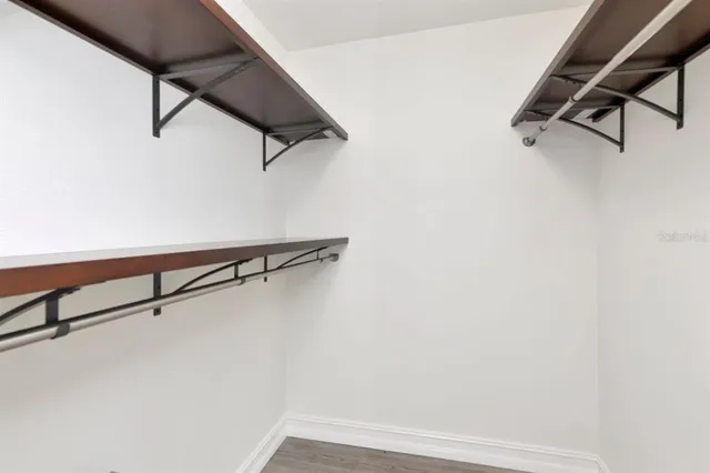 a view of a room with racks on the wall