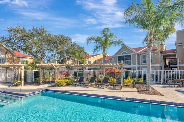 a view of a house with a swimming pool
