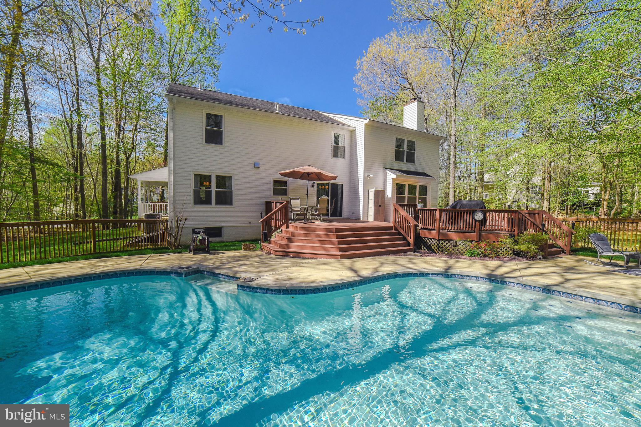 690 Small Reward Road Huntingtown, MD 20639 - Photo 26 of 30 In ground pool with waterfall is amazing!