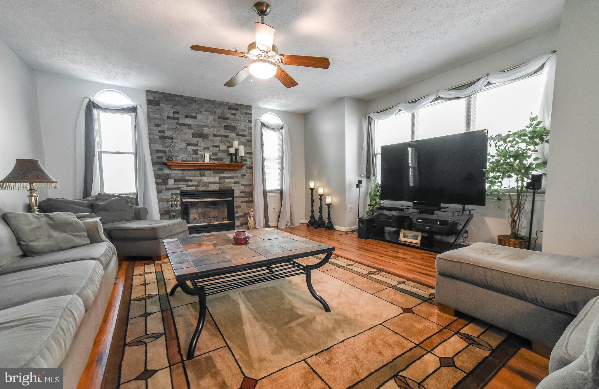 690 Small Reward Road Huntingtown, MD 20639 - Photo 4 of 30 Family Room with fireplace