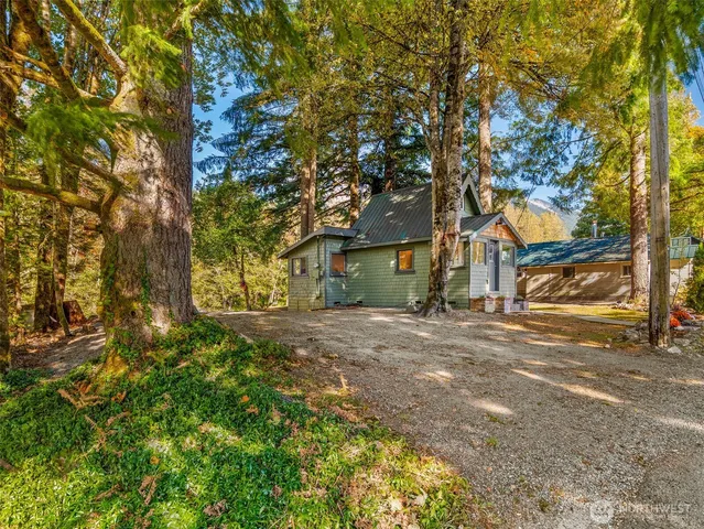 a view of a lake with furniture