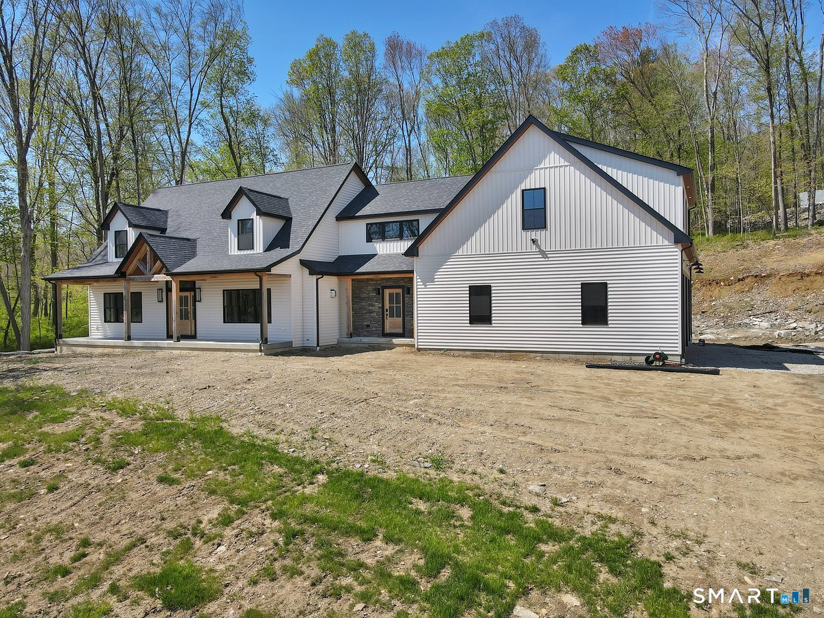 106 South Street Extension Coventry, CT 06238 - Photo 27 of 33 a view of a house with a yard