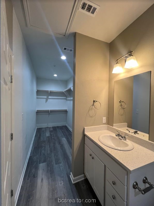1305 West Villa Maria Road, Unit D105 Bryan, TX 77801 - Photo 20 of 20 a bathroom with a sink and a mirror