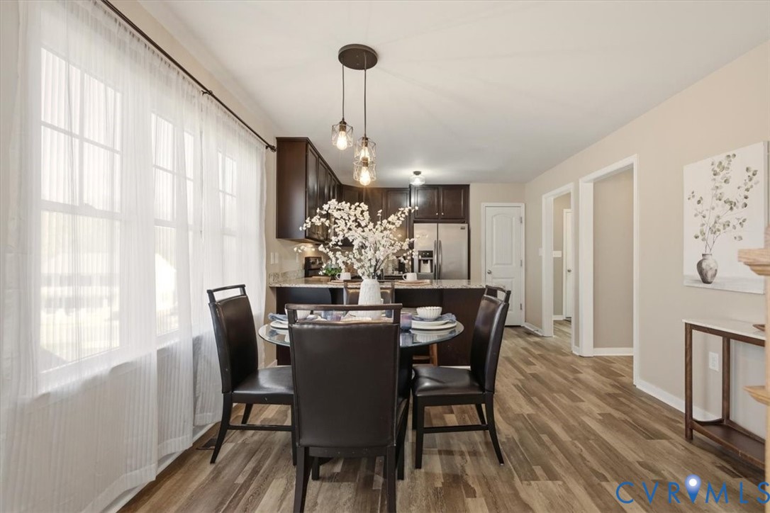 5312 Old Glory Road Chesterfield, VA 23832 - Photo 12 of 48 a view of a dining room with furniture window and wooden floor