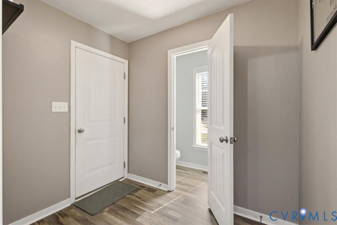 5312 Old Glory Road Chesterfield, VA 23832 - Photo 19 of 48 a view of a livingroom from a hallway