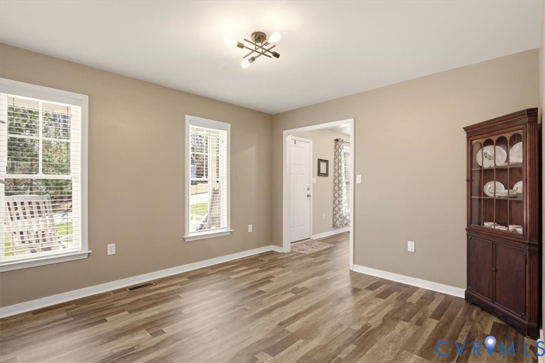5312 Old Glory Road Chesterfield, VA 23832 - Photo 22 of 48 a view of an empty room with window and wooden floor