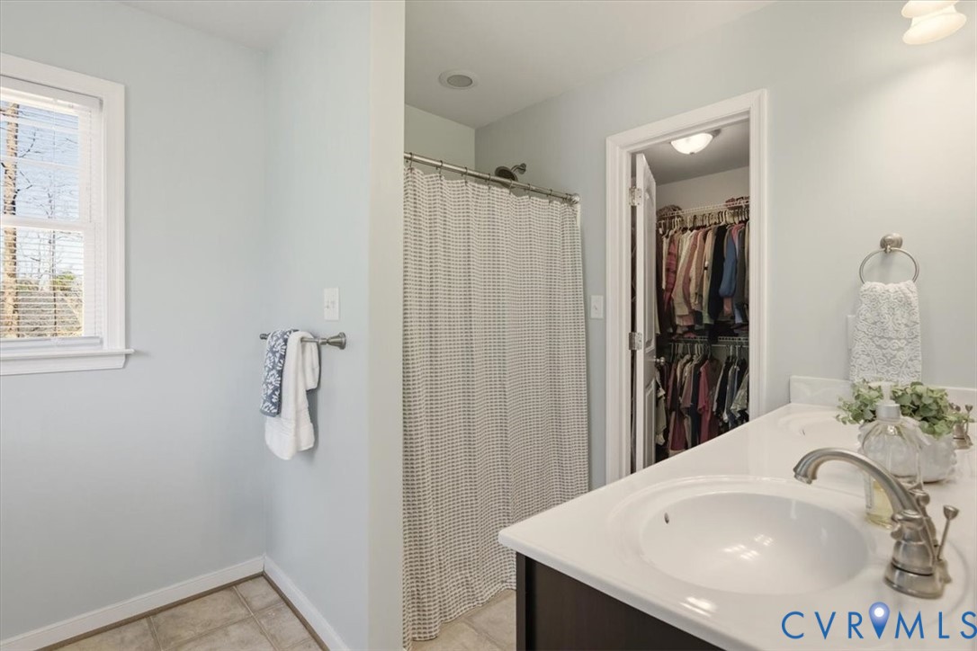 5312 Old Glory Road Chesterfield, VA 23832 - Photo 28 of 48 a bathroom with a sink and a mirror