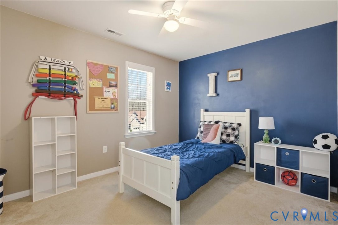 5312 Old Glory Road Chesterfield, VA 23832 - Photo 33 of 48 a bedroom with a bed and cabinets