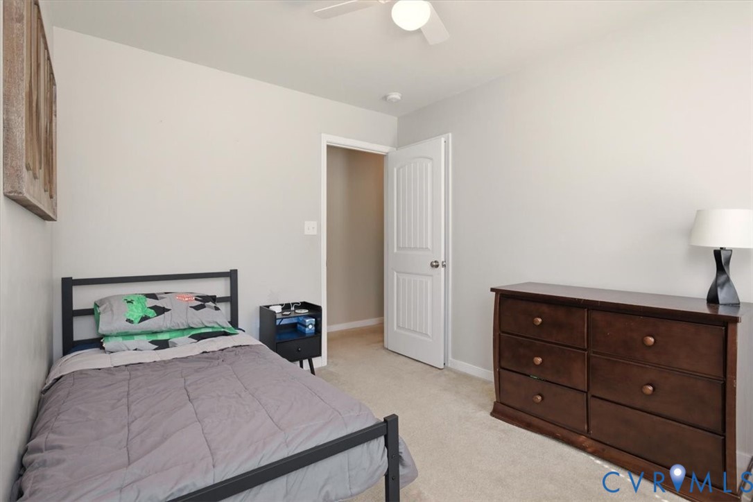 5312 Old Glory Road Chesterfield, VA 23832 - Photo 36 of 48 a bedroom with a bed and a dresser in it