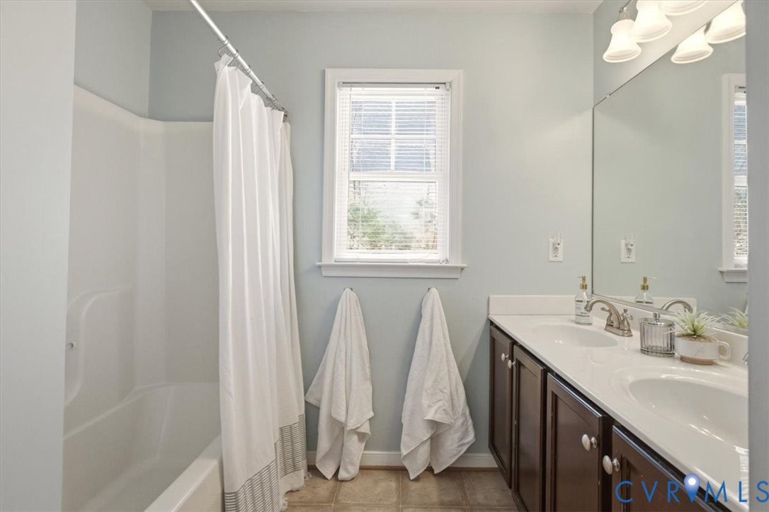 5312 Old Glory Road Chesterfield, VA 23832 - Photo 37 of 48 a bathroom with double vanity sink and a mirror