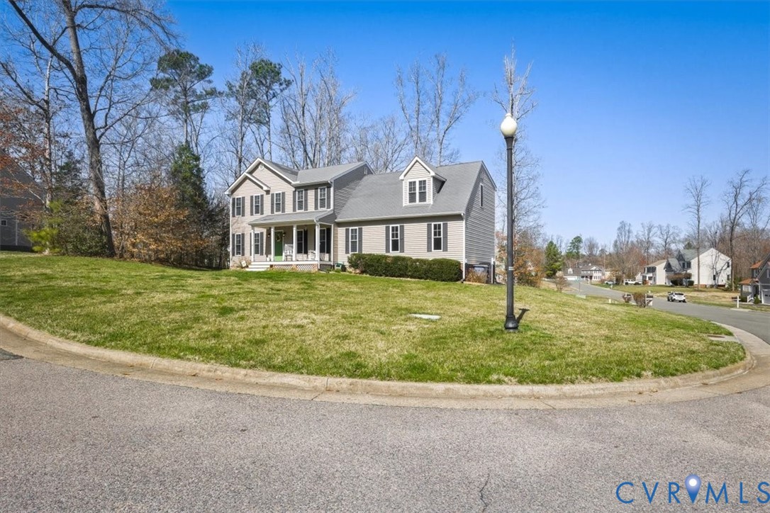 5312 Old Glory Road Chesterfield, VA 23832 - Photo 42 of 48 a front view of a house with a yard