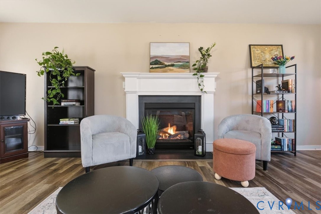 5312 Old Glory Road Chesterfield, VA 23832 - Photo 6 of 48 a living room with furniture and a fireplace