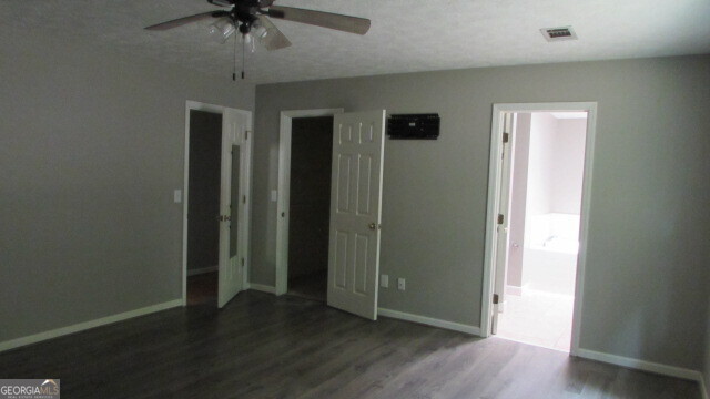 40 River Point Drive LaGrange, GA 30240 - Photo 15 of 17 an empty room with wooden floor closet and windows