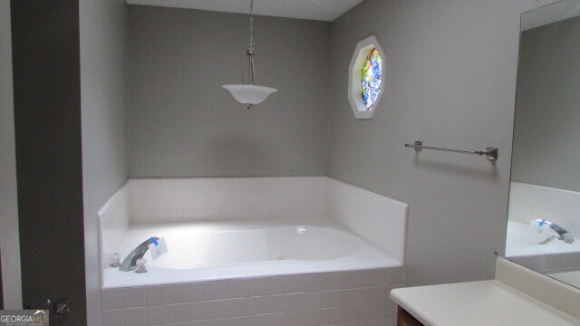 40 River Point Drive LaGrange, GA 30240 - Photo 16 of 17 a bathroom with a bathtub and sink