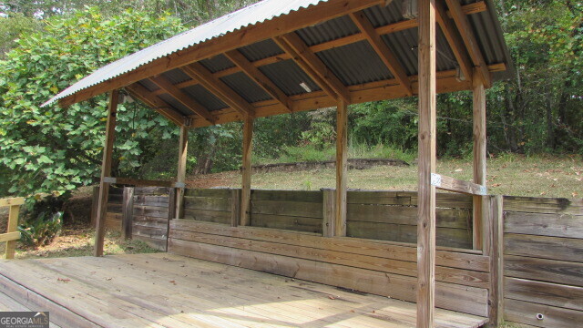 40 River Point Drive LaGrange, GA 30240 - Photo 5 of 17 a backyard of a house with wooden floor and outdoor seating